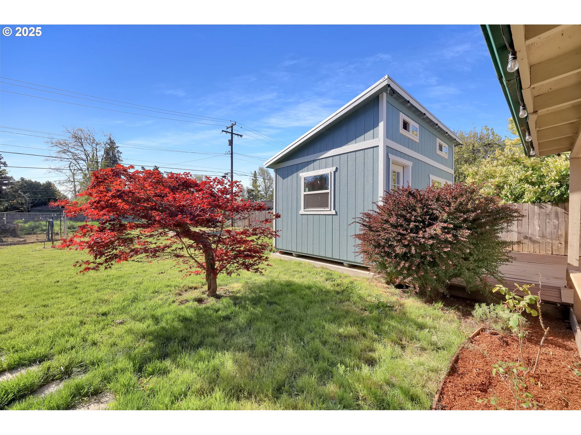 830 Jerry Street Eugene, OR 97402 - Photo 20 of 22 a front view of a house with a yard