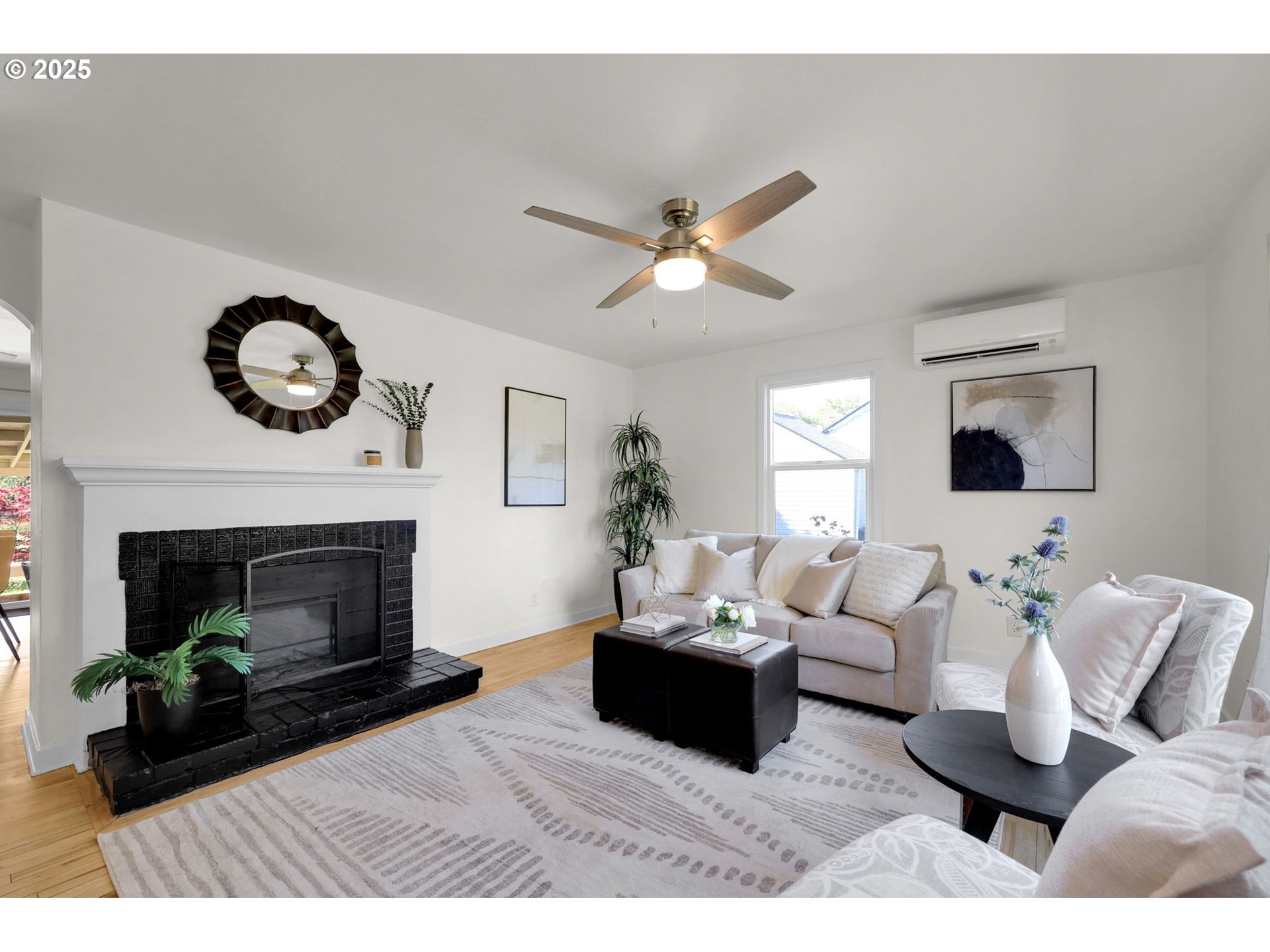 830 Jerry Street Eugene, OR 97402 - Photo 3 of 22 a living room with furniture a fireplace and a flat screen tv