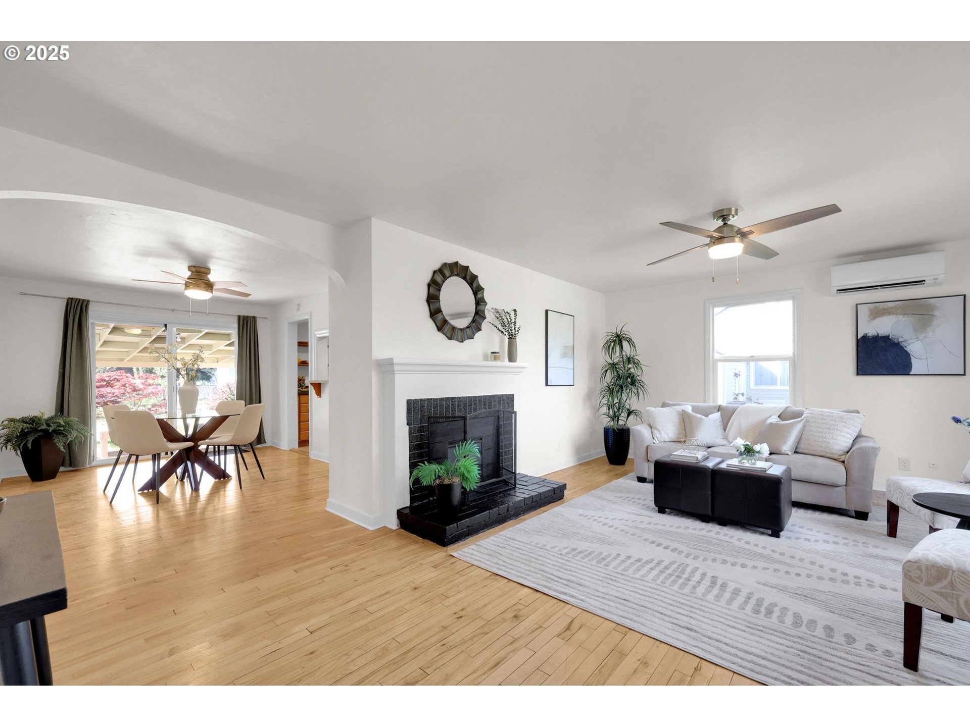 830 Jerry Street Eugene, OR 97402 - Photo 5 of 22 a living room with furniture and a fireplace