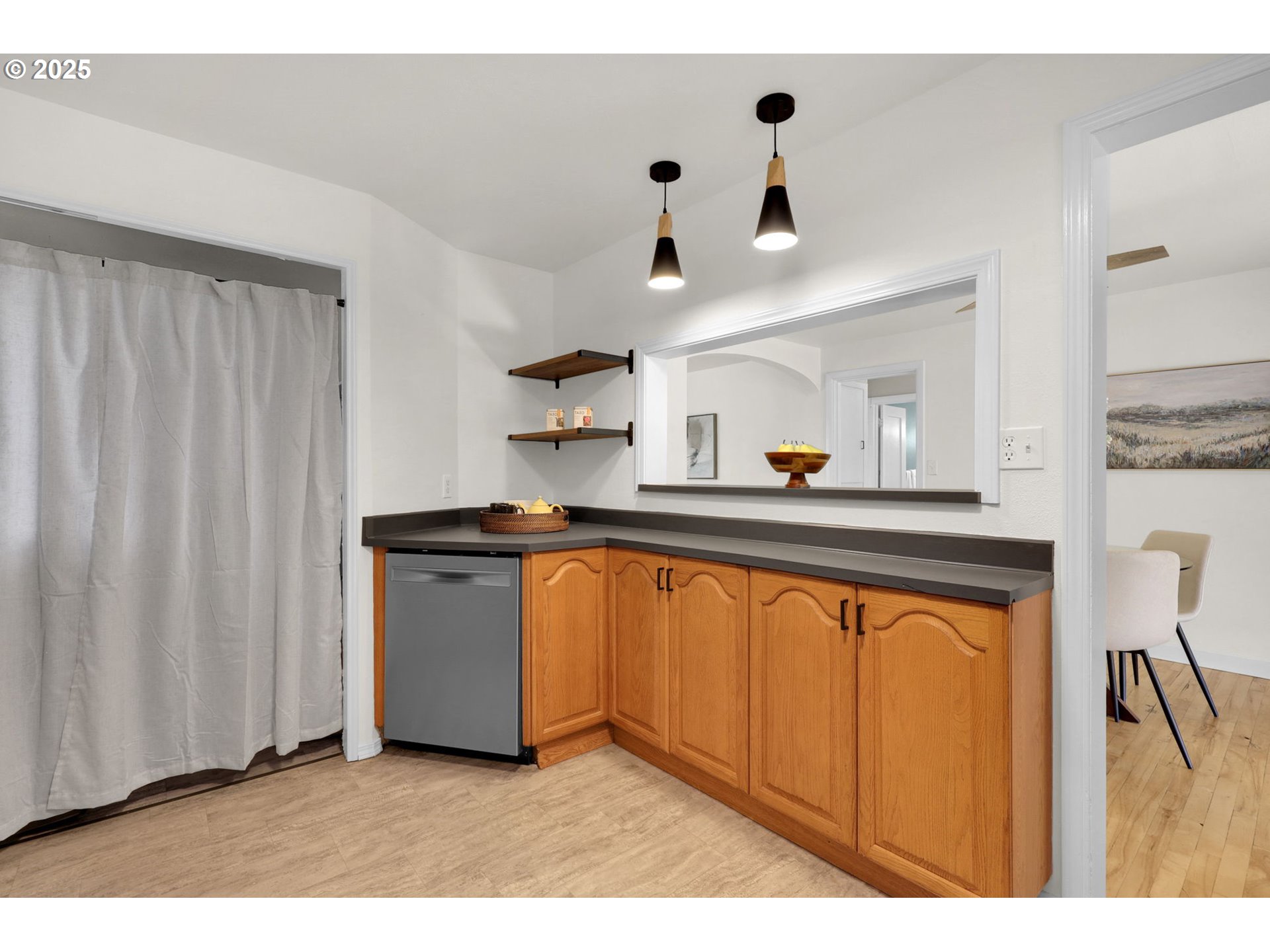 830 Jerry Street Eugene, OR 97402 - Photo 9 of 22 a kitchen with stainless steel appliances granite countertop a sink and a refrigerator