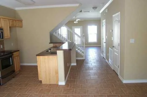 a view of a hallway with staircase