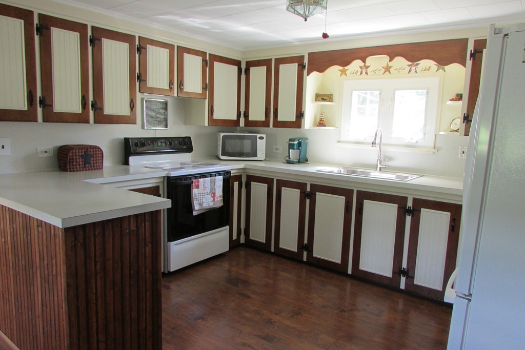 75 Stage Road Westhampton, MA 01027 - Photo 14 of 30 a kitchen with stainless steel appliances granite countertop a stove and a sink