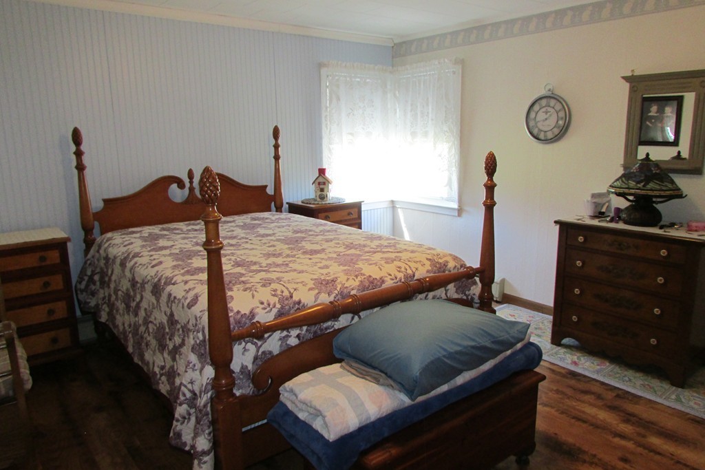 75 Stage Road Westhampton, MA 01027 - Photo 18 of 30 a bed sitting in a bedroom next to a window with dresser
