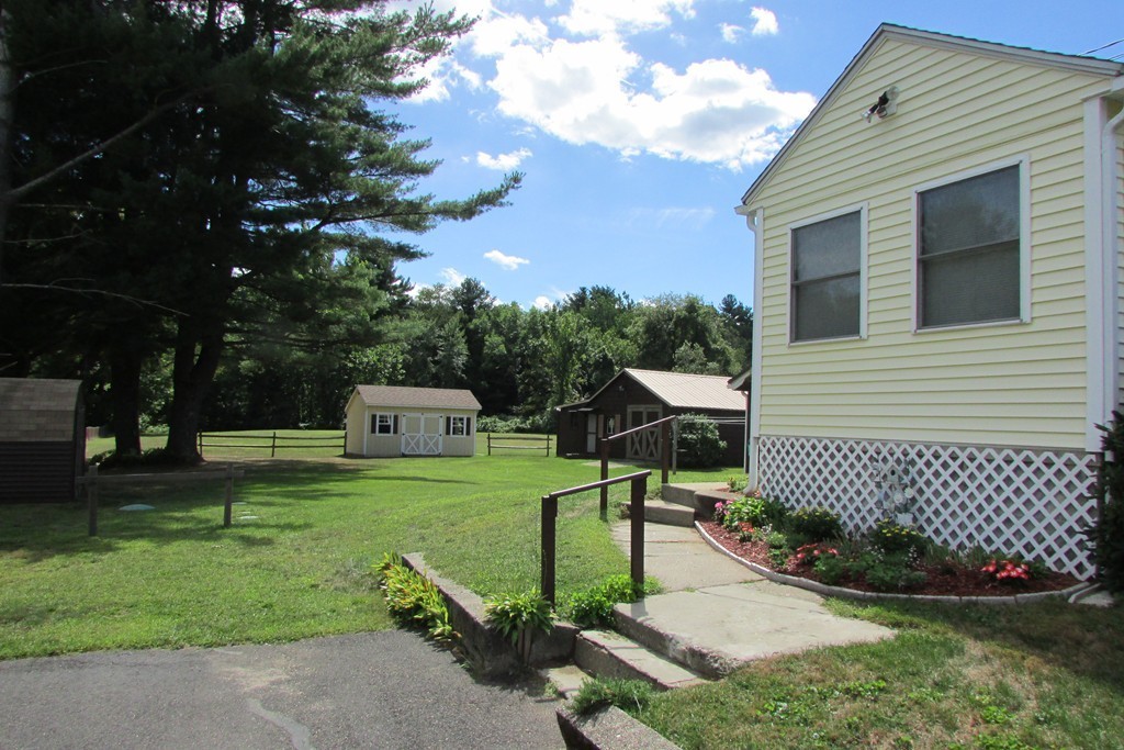 75 Stage Road Westhampton, MA 01027 - Photo 3 of 30 a view of a chair and table in the backyard
