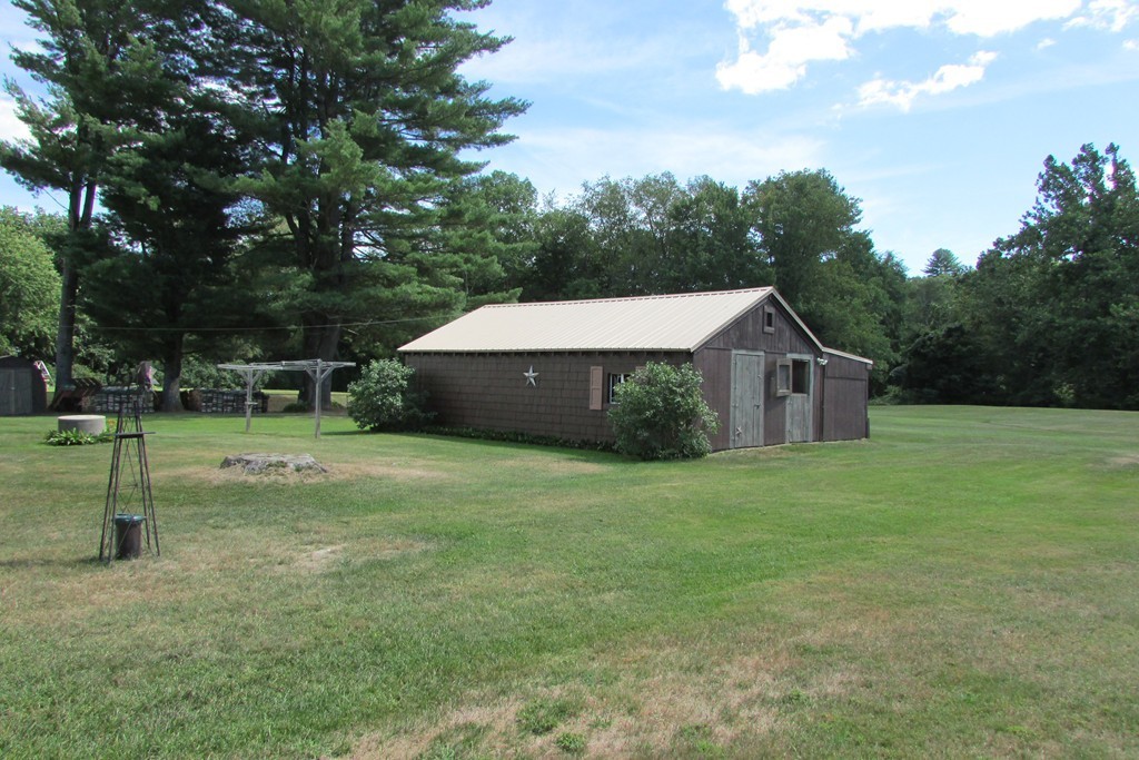 75 Stage Road Westhampton, MA 01027 - Photo 5 of 30 a house with trees in the background