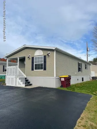 a front view of a house with a garage