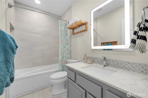 a workspace with furniture and cabinets
