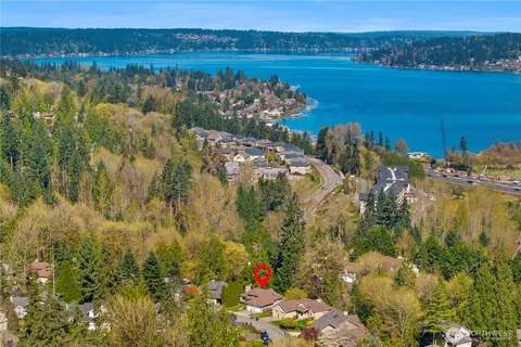 an aerial view of residential house and outdoor space