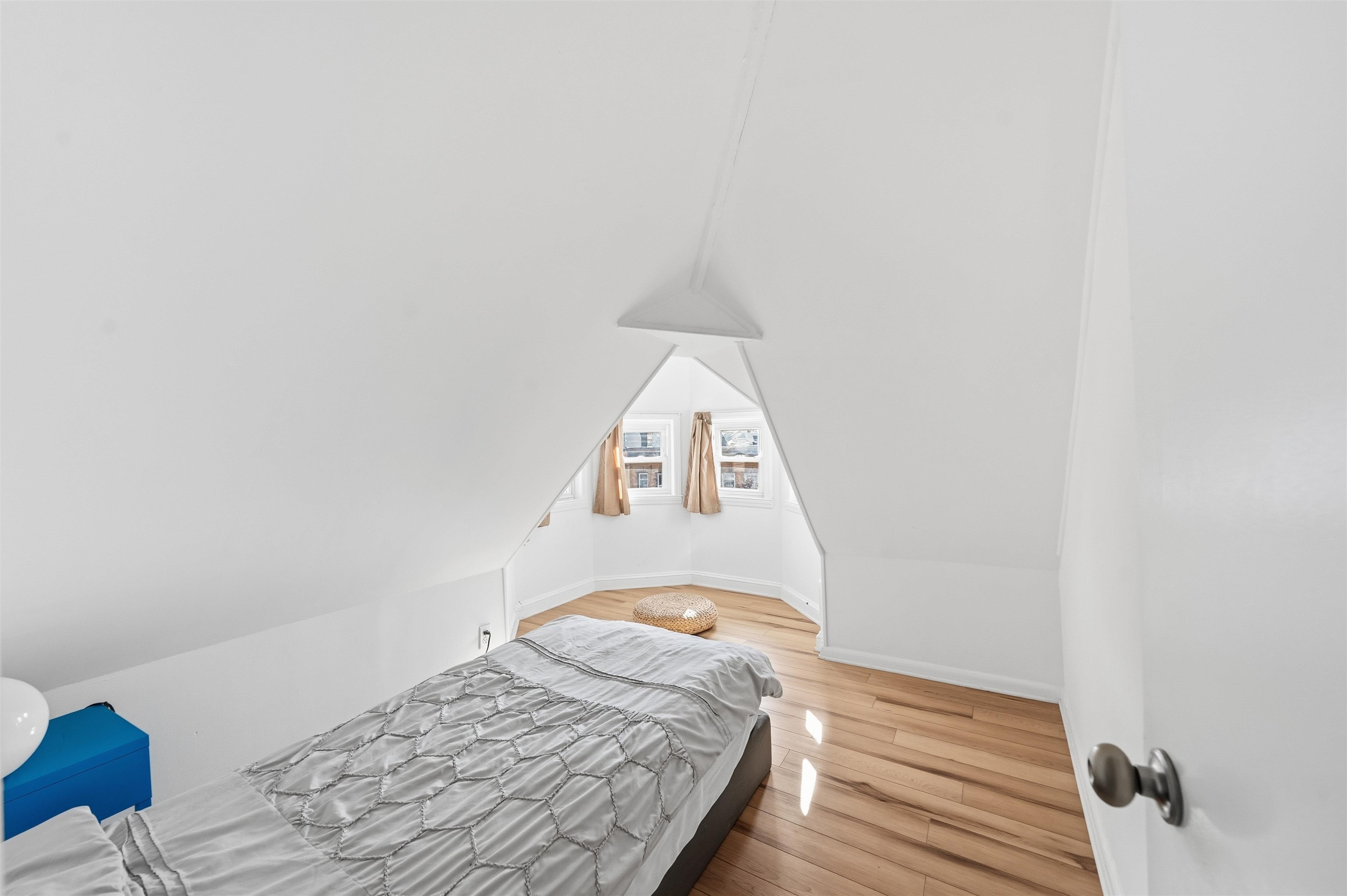 124 73rd Street, Unit 3 North Bergen, NJ 07047 - Photo 8 of 14 a bedroom with a bed and a wooden floor