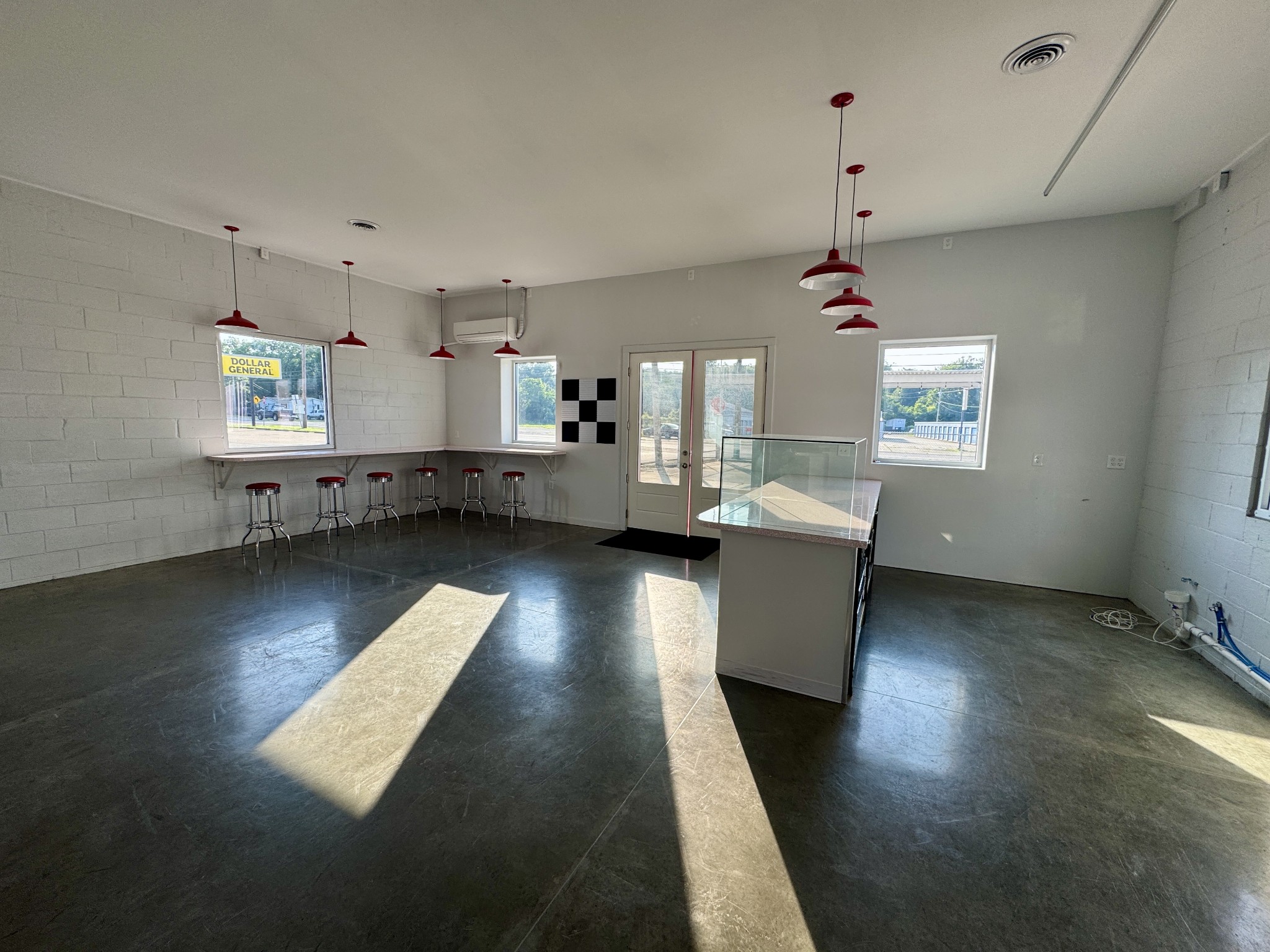 810 North 1st Street Pulaski, TN 38478 - Photo 22 of 33 a view of a kitchen with furniture and wooden floor