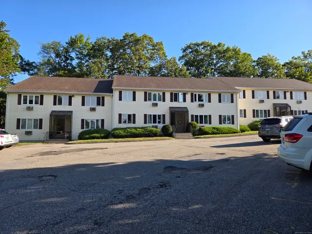 a house with garden in front of it