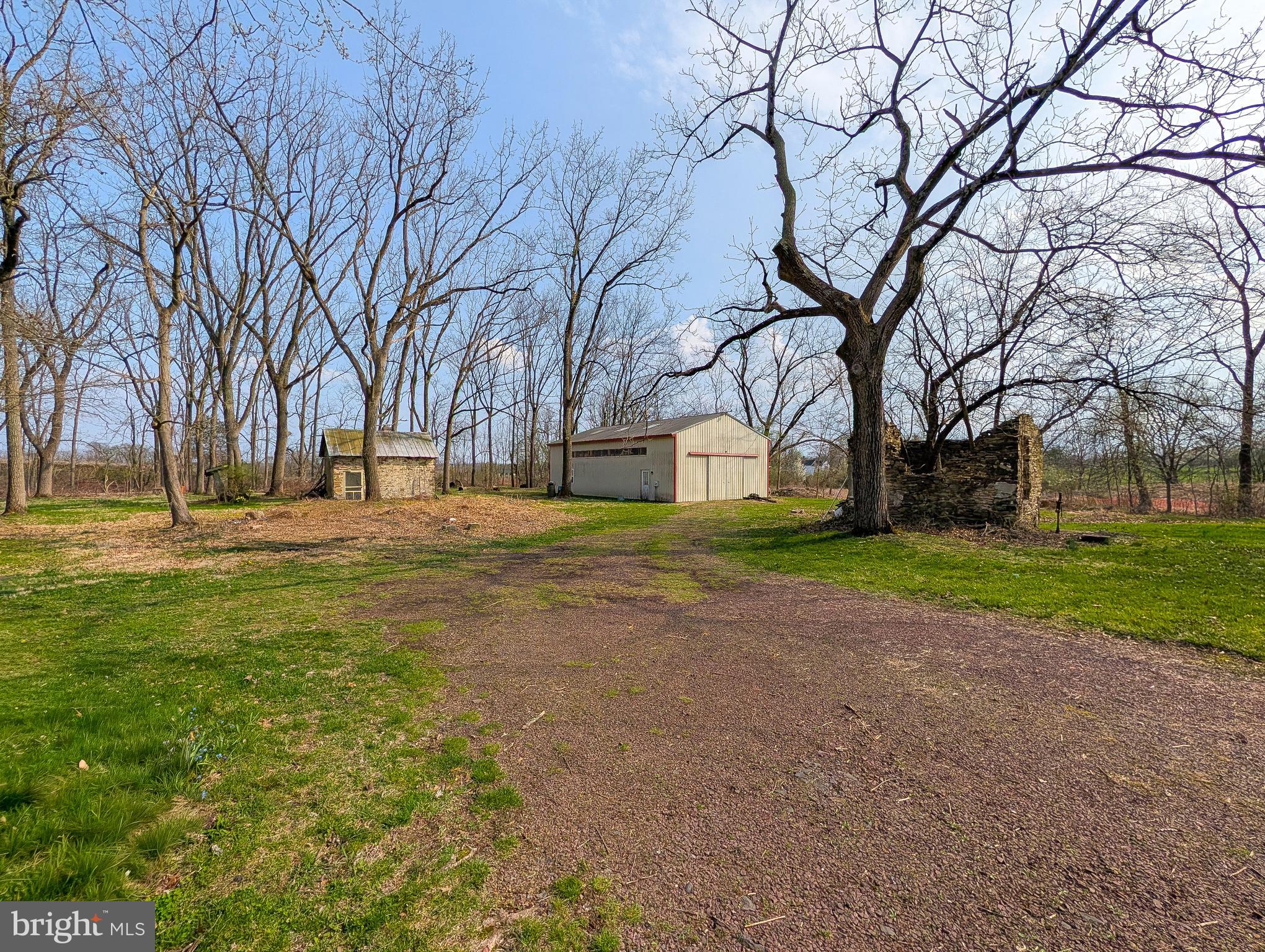 173 Township Line Road Line Lexington, PA 18932 - Photo 5 of 7 a view of road with large trees