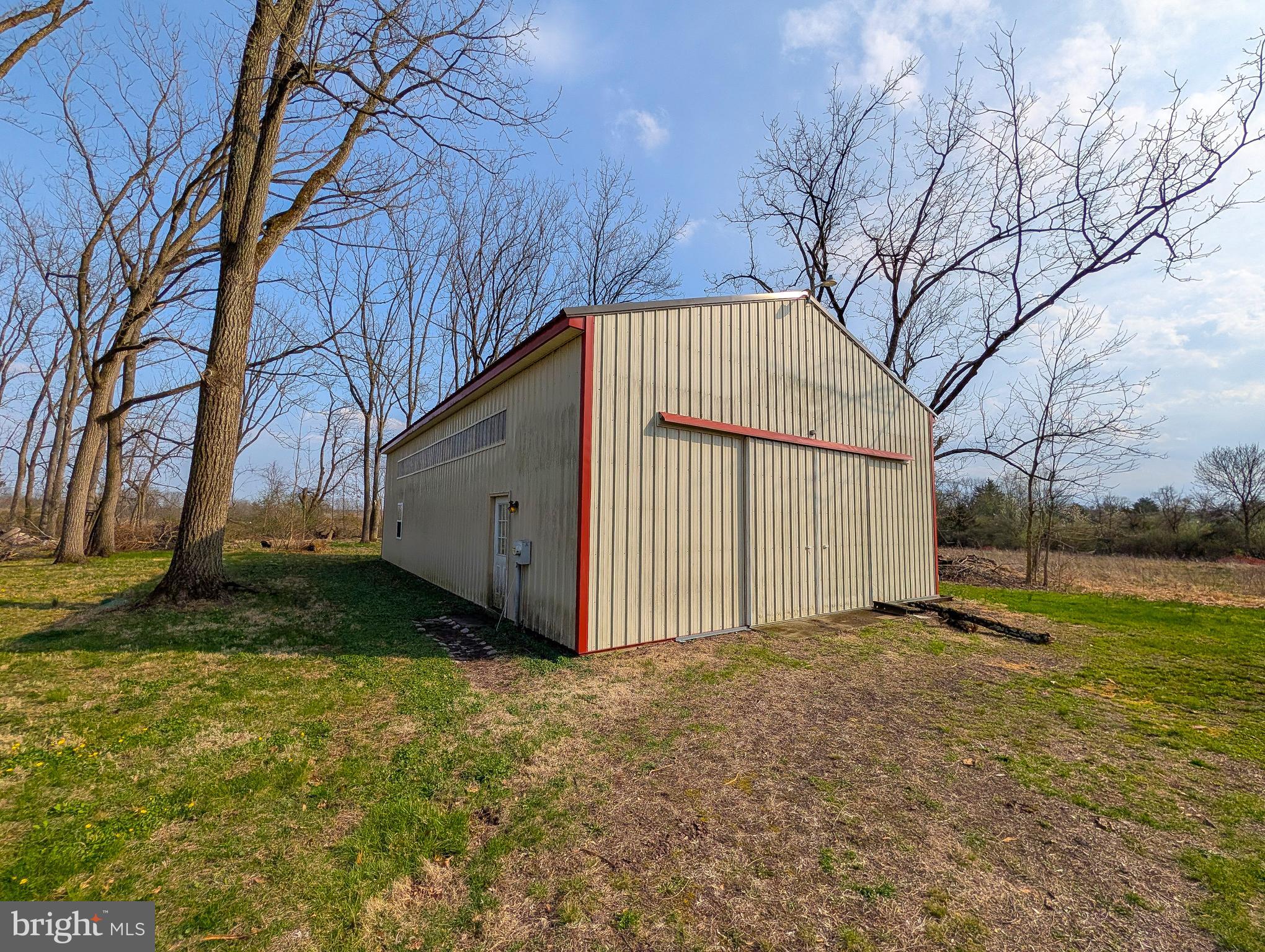 173 Township Line Road Line Lexington, PA 18932 - Photo 6 of 7 a view of a backyard with large trees
