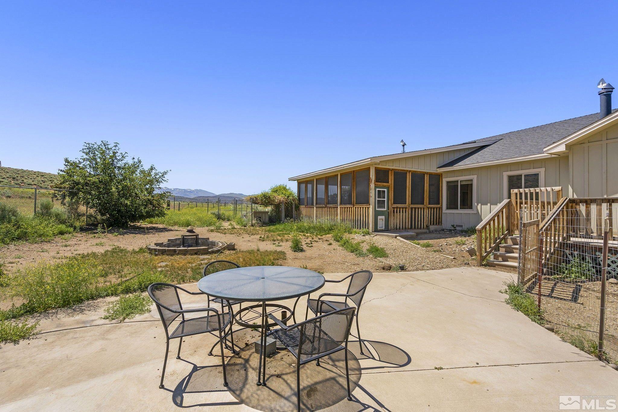 1683 Windmill Road Gardnerville, NV 89410 - Photo 14 of 40 a view of a house with backyard and sitting area