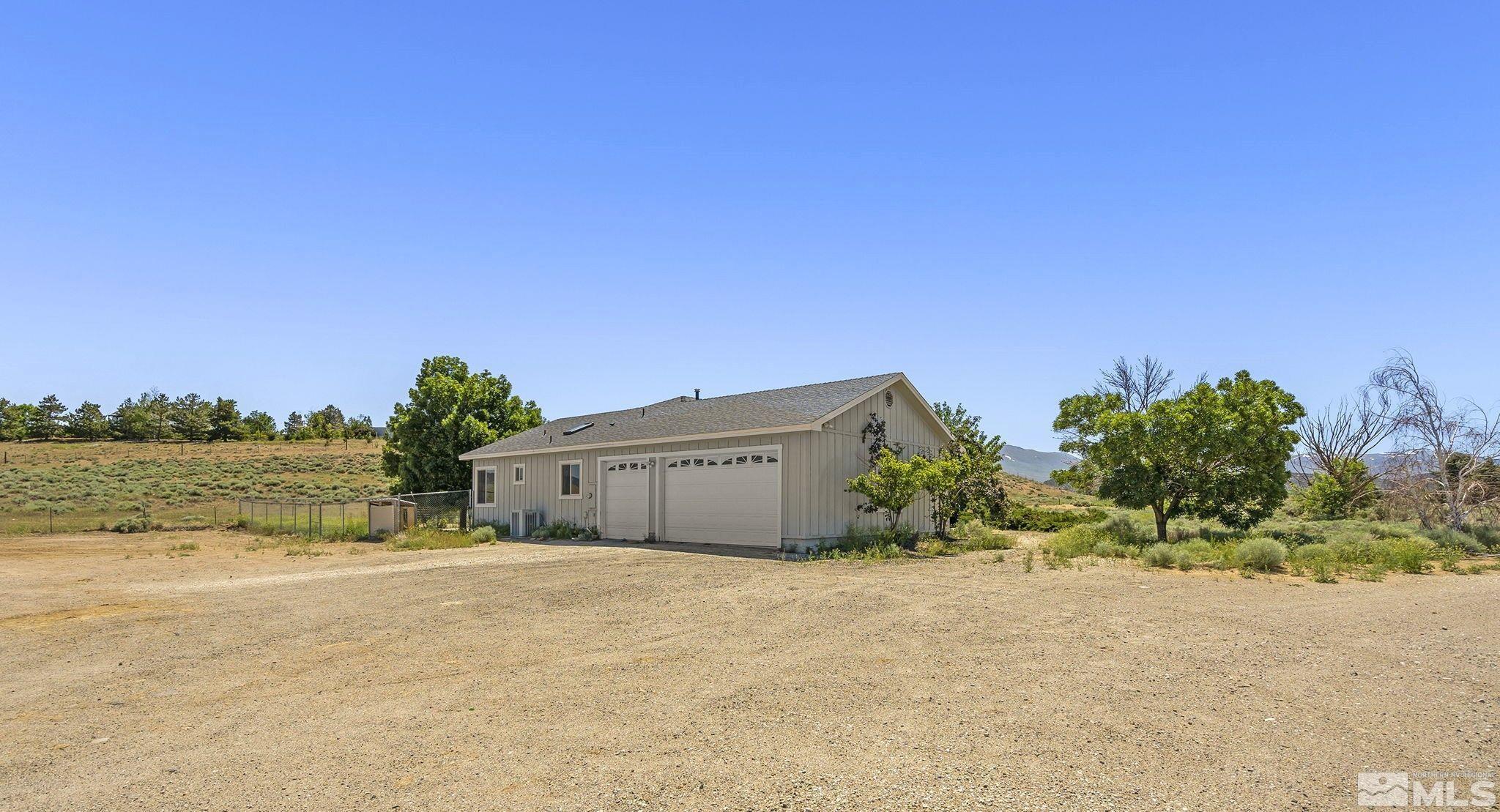 1683 Windmill Road Gardnerville, NV 89410 - Photo 2 of 40 a view of a outdoor space with a house