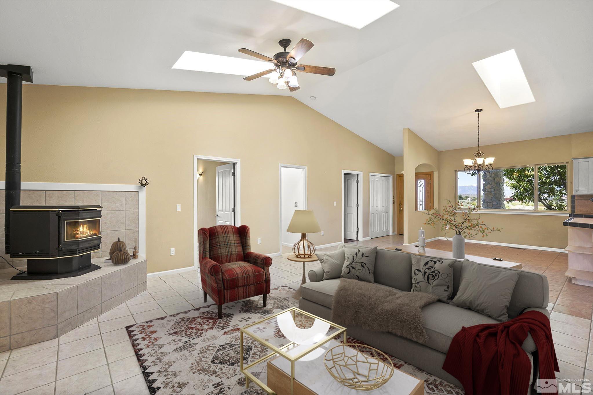 1683 Windmill Road Gardnerville, NV 89410 - Photo 23 of 40 a living room with furniture and a fireplace