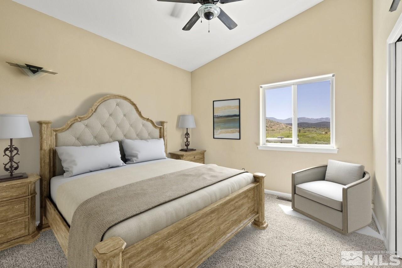 1683 Windmill Road Gardnerville, NV 89410 - Photo 25 of 40 a bedroom with bed and window