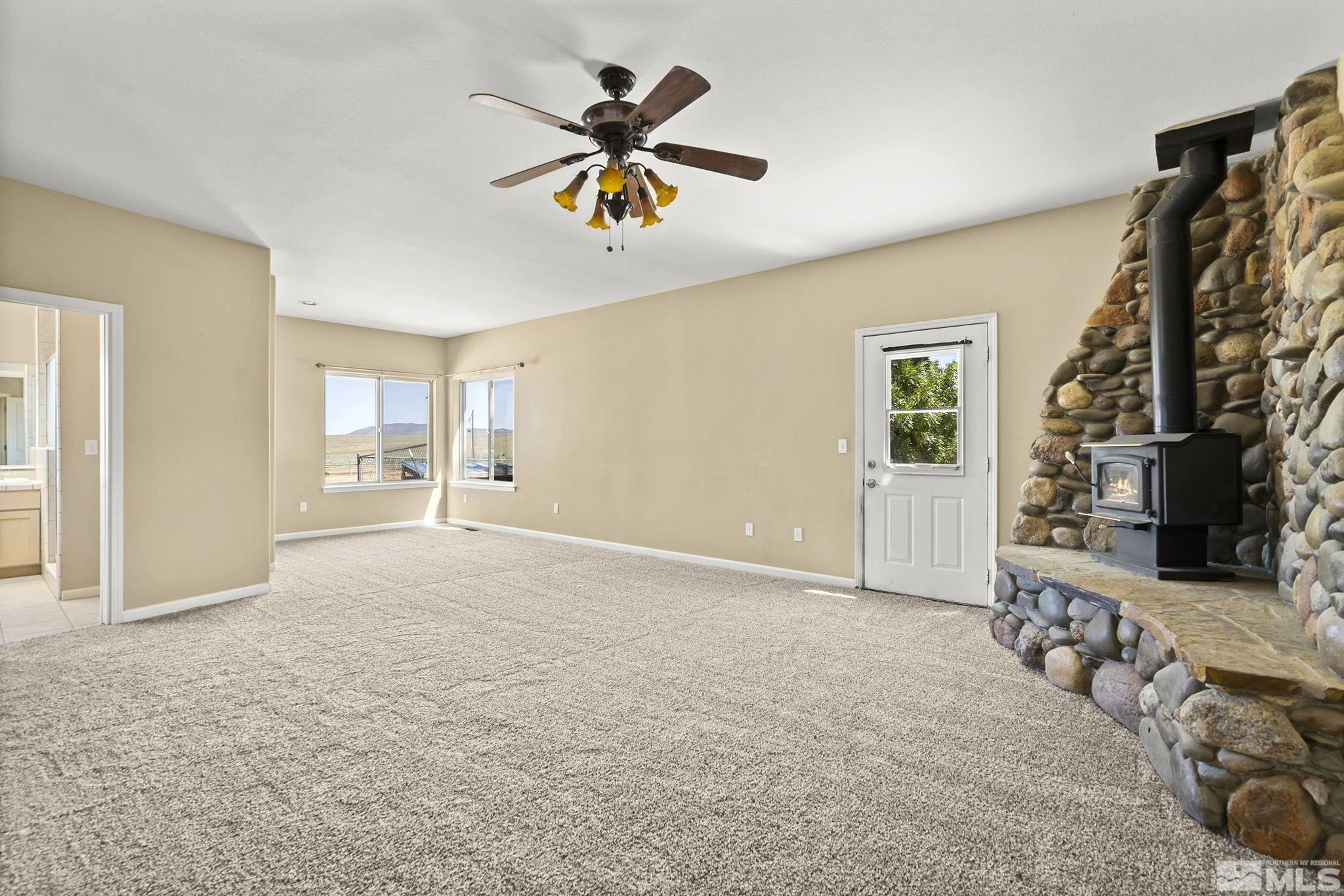 1683 Windmill Road Gardnerville, NV 89410 - Photo 7 of 40 a view of an empty room with a window