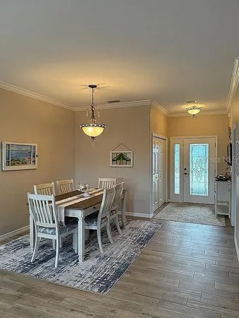 a view of a dining room with furniture