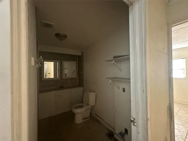 a bathroom with a toilet