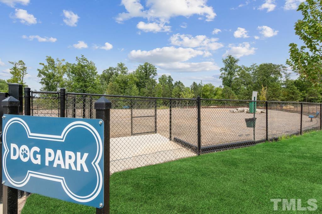 2269 Abbeyhill Drive Raleigh, NC 27610 - Photo 11 of 13 a view of a chair and table in the garden