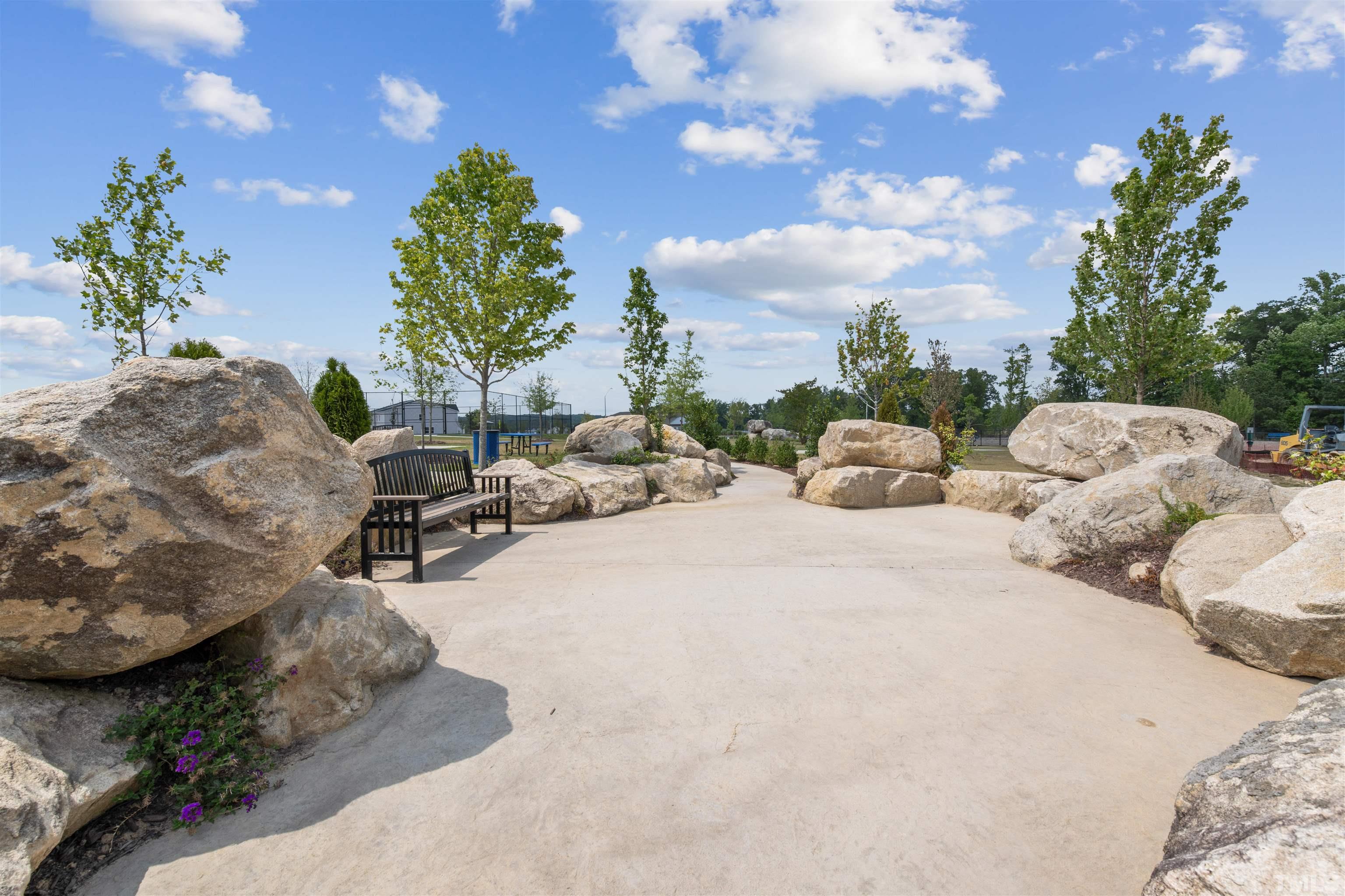 2269 Abbeyhill Drive Raleigh, NC 27610 - Photo 13 of 13 a view of a backyard with couches and a potted plant