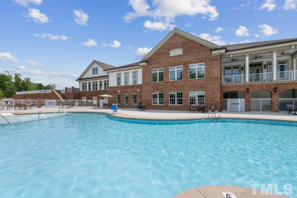 2269 Abbeyhill Drive Raleigh, NC 27610 - Photo 8 of 13 a front view of a house with garden