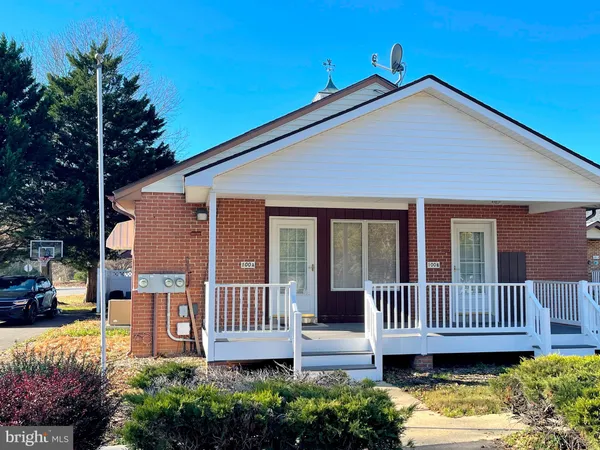 front view of a house with a deck