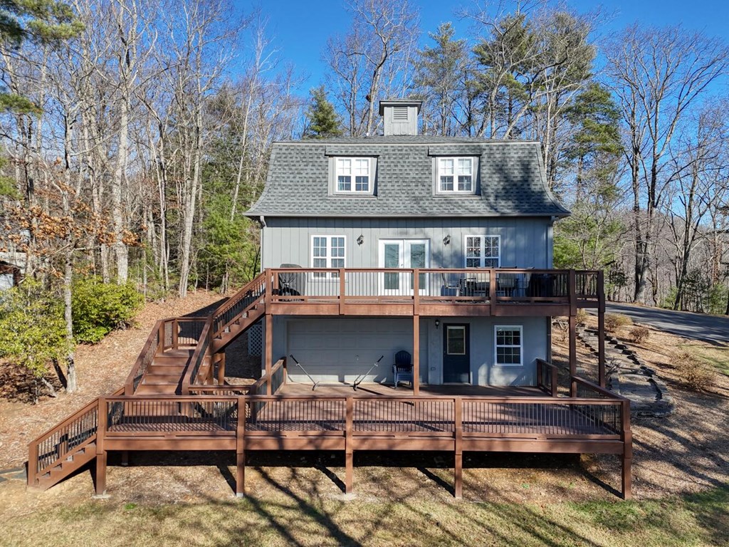 417 Hidden Forest Lane Hayesville, NC 28904 - Photo 14 of 26 a front view of a house with wooden stairs