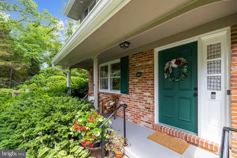 a front view of a house with a porch