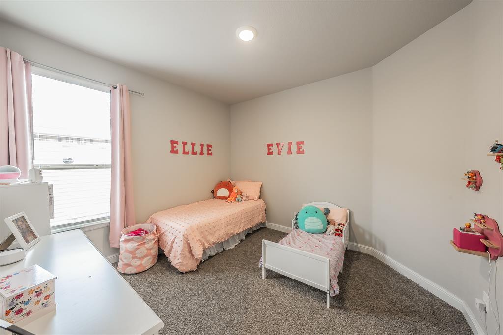 1212 Bosque Lane Weatherford, TX 76087 - Photo 33 of 38 a bedroom with a bed and a window