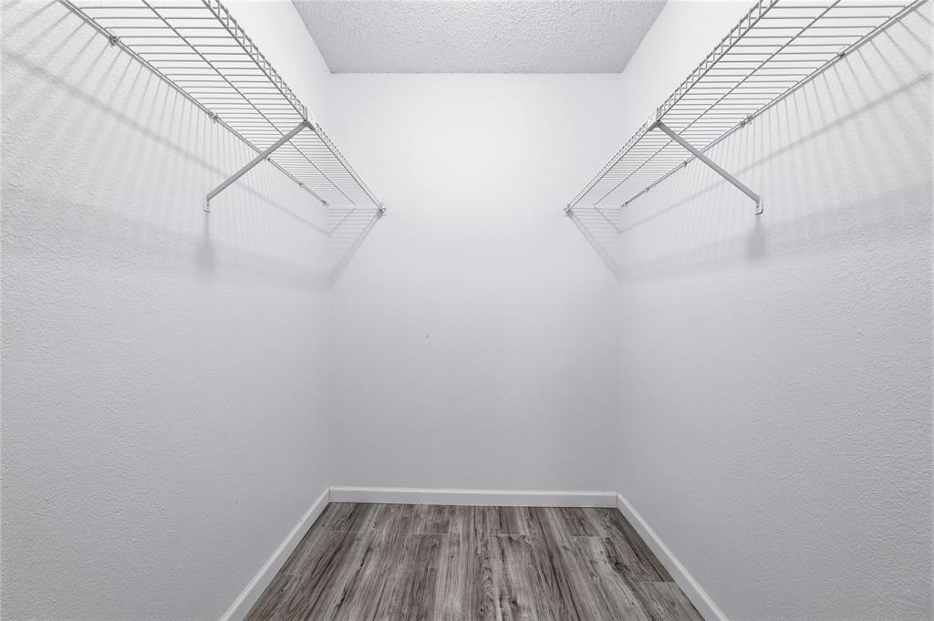 12482 Abrams Road, Unit 1327 Dallas, TX 75243 - Photo 18 of 32 a view of small space with racks on the wall