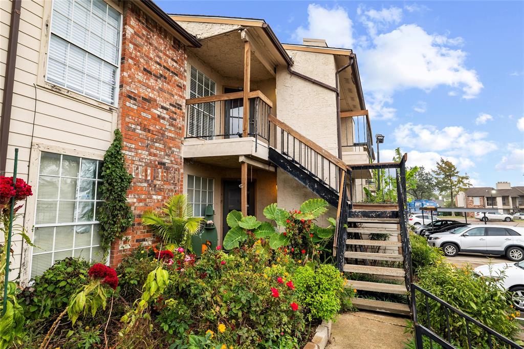12482 Abrams Road, Unit 1327 Dallas, TX 75243 - Photo 24 of 32 a view of a house with a flower garden
