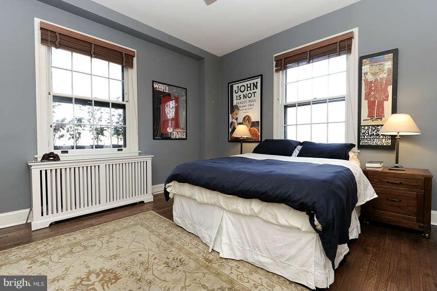 3000 Tilden Street Northwest, Unit 102 Washington, DC 20008 - Photo 14 of 29 a spacious bedroom with a bed and a window