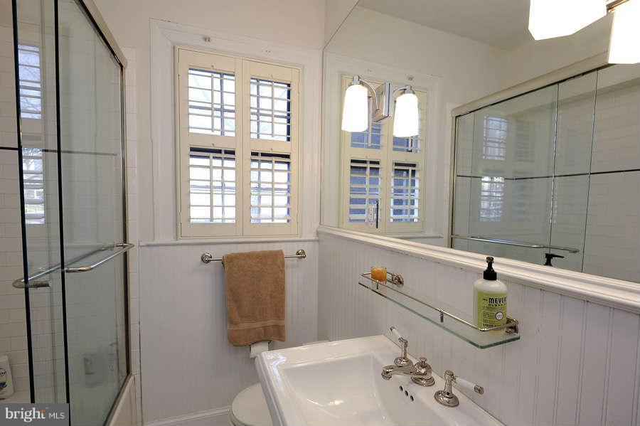 3000 Tilden Street Northwest, Unit 102 Washington, DC 20008 - Photo 21 of 29 a bathroom with a sink and a window