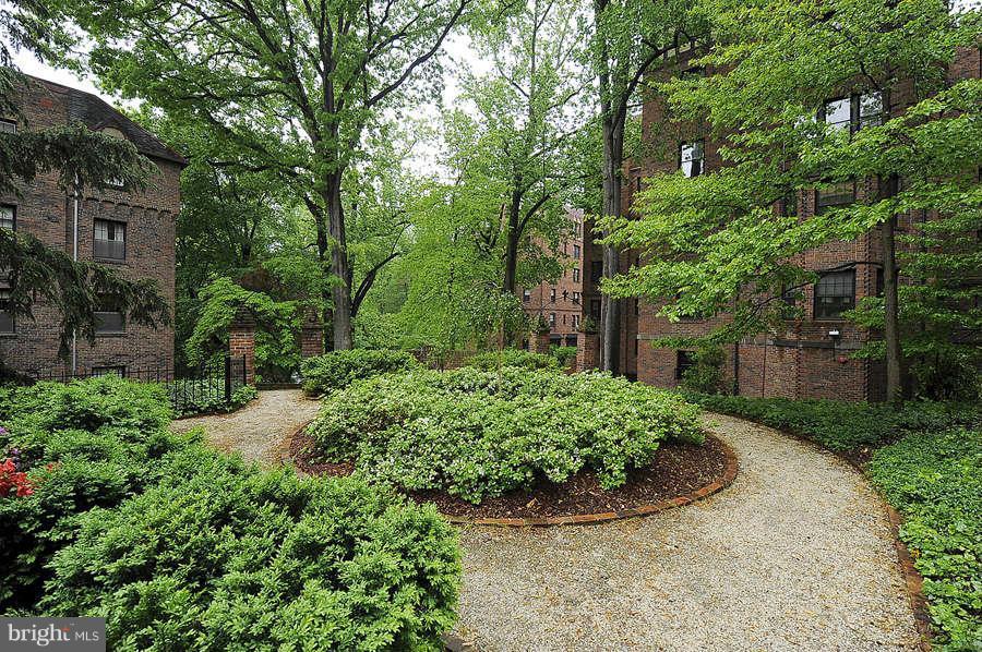 3000 Tilden Street Northwest, Unit 102 Washington, DC 20008 - Photo 26 of 29 front view of a house with a yard