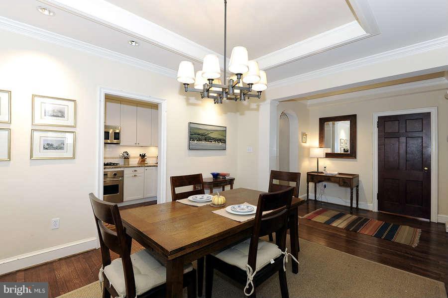 3000 Tilden Street Northwest, Unit 102 Washington, DC 20008 - Photo 7 of 29 a view of a dining room with furniture and wooden floor