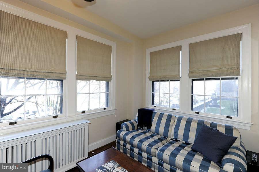 3000 Tilden Street Northwest, Unit 102 Washington, DC 20008 - Photo 9 of 29 a view of a bedroom with furniture window and outside view