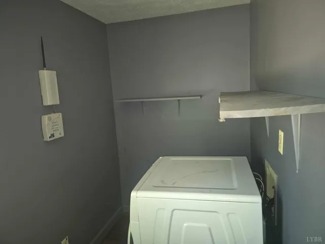 a view of a room with racks on the wall