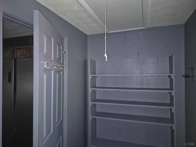 a bathroom with a toilet and a bathtub