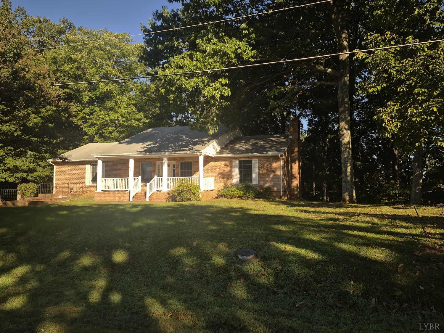 404 Darrell Lane Hurt, VA 24563 - Photo 23 of 31 a front view of a house with a yard
