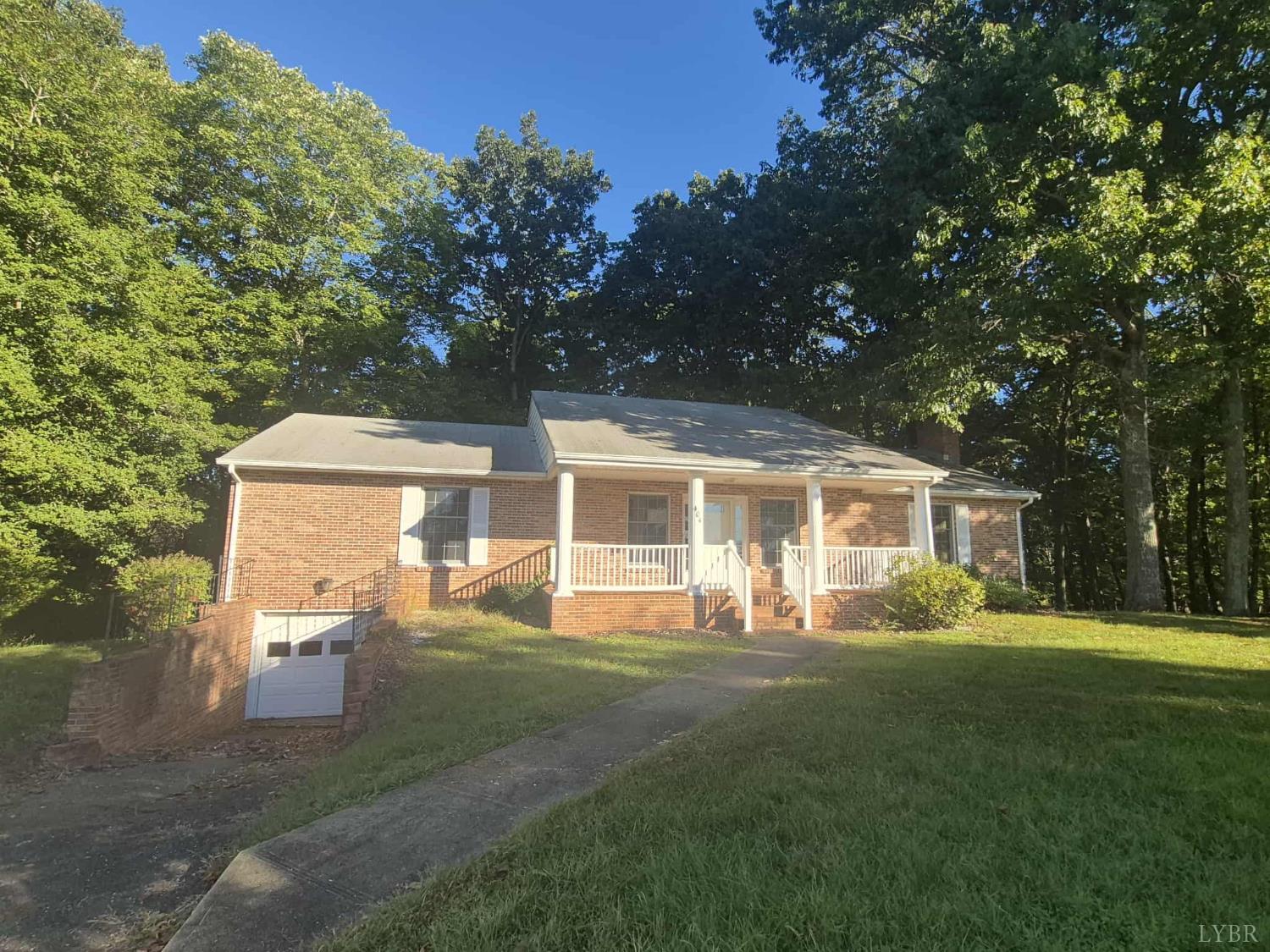 404 Darrell Lane Hurt, VA 24563 - Photo 24 of 31 a front view of house with yard and green space