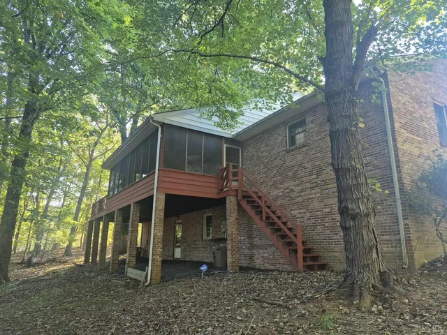 a backyard of a house with lots of green space