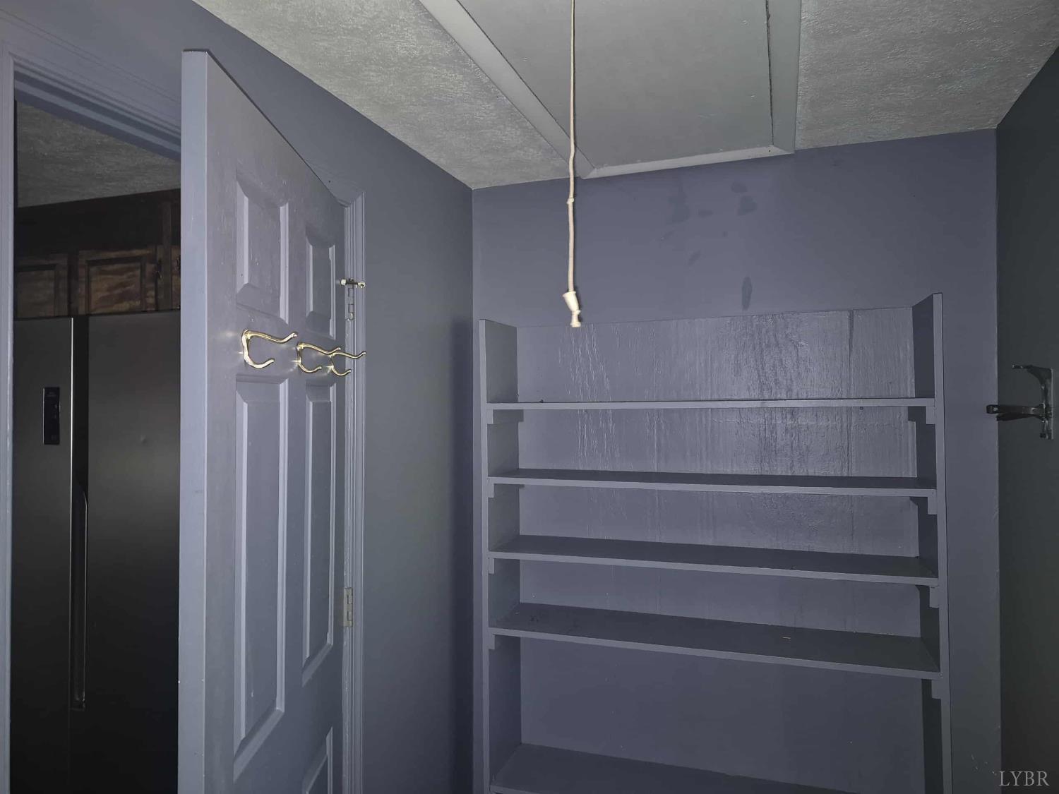 404 Darrell Lane Hurt, VA 24563 - Photo 8 of 31 a view of a room with racks on the wall