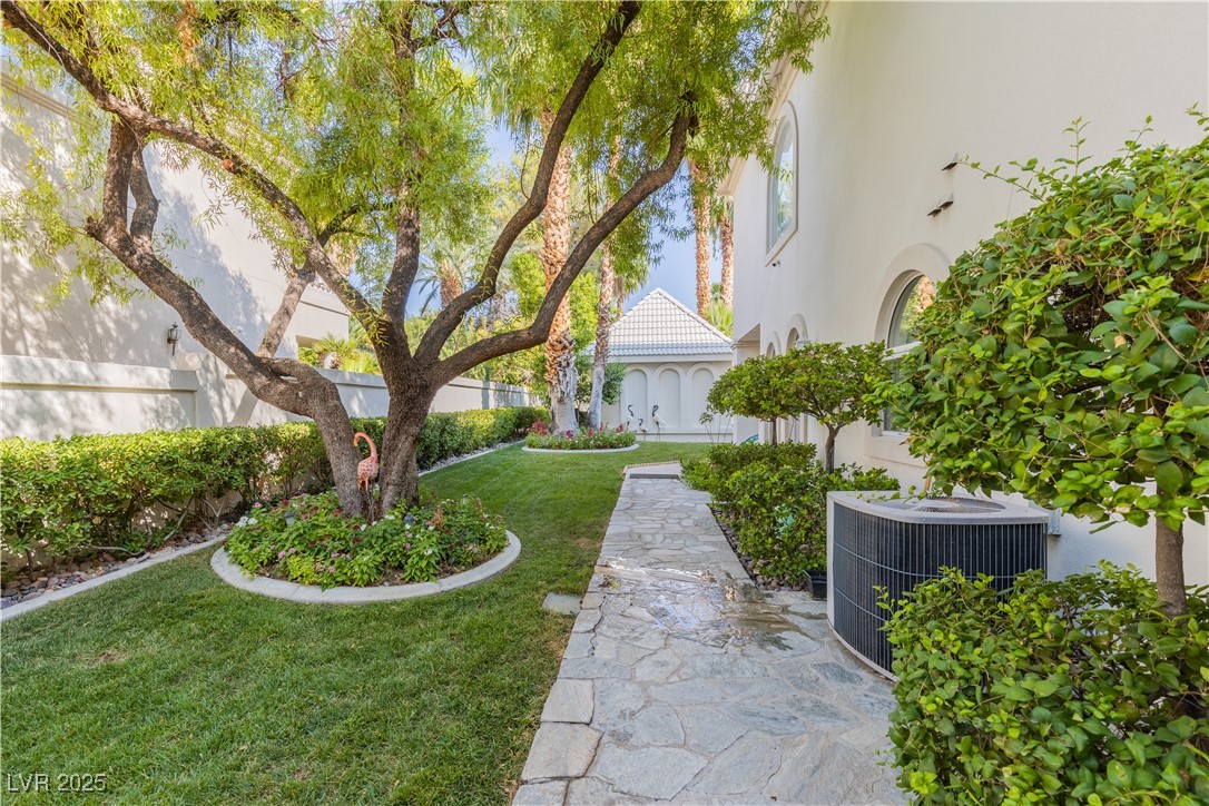 2339 Prometheus Court Henderson, NV 89074 - Photo 16 of 92 View of yard featuring central AC