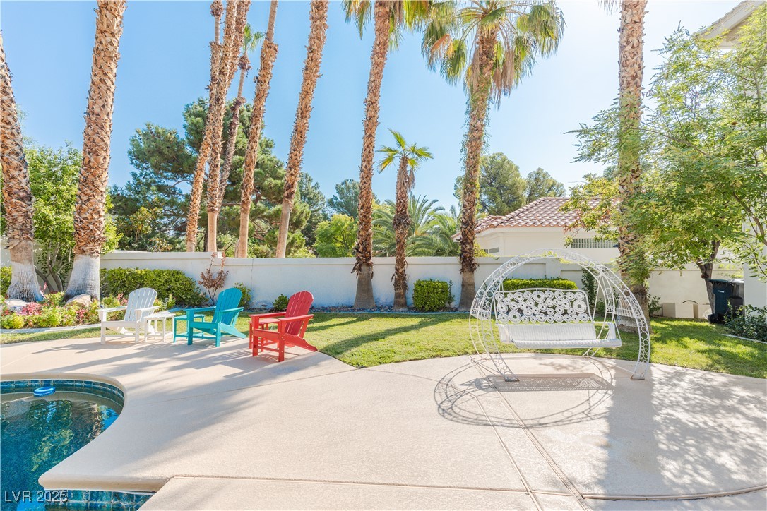 2339 Prometheus Court Henderson, NV 89074 - Photo 3 of 92 View of patio with a pool and fence