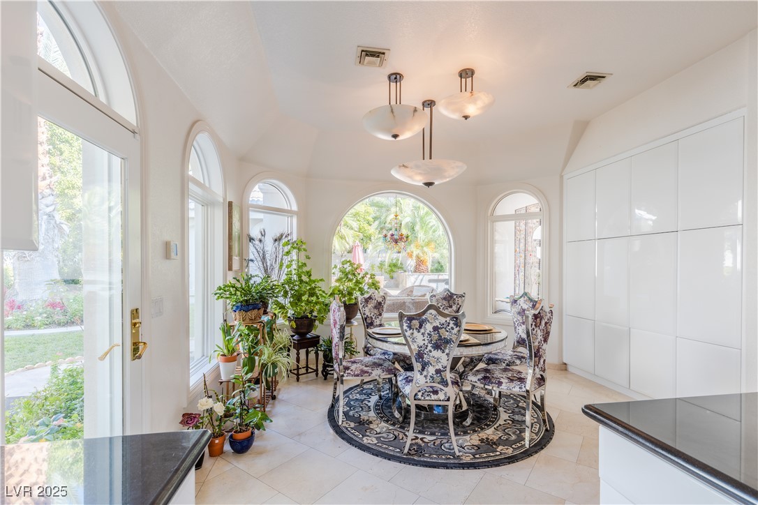 2339 Prometheus Court Henderson, NV 89074 - Photo 35 of 92 Dining space with visible vents and light tile pat