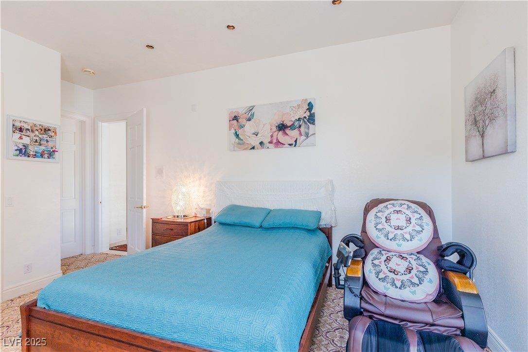 2339 Prometheus Court Henderson, NV 89074 - Photo 63 of 92 Bedroom featuring baseboards
