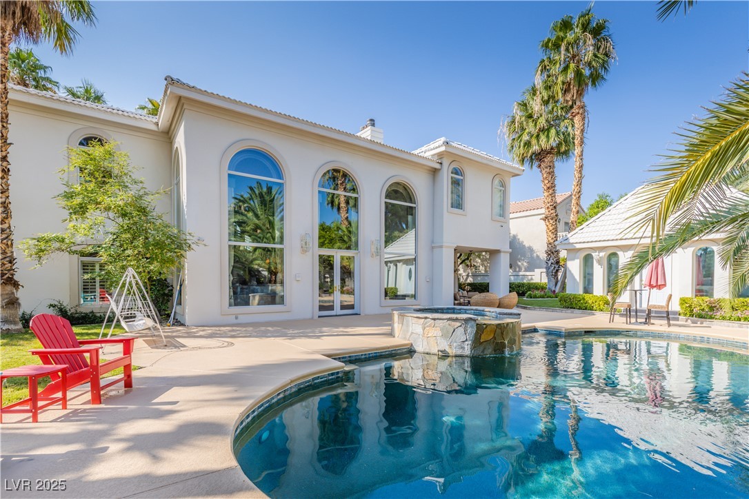 2339 Prometheus Court Henderson, NV 89074 - Photo 8 of 92 View of swimming pool with french doors, a patio a