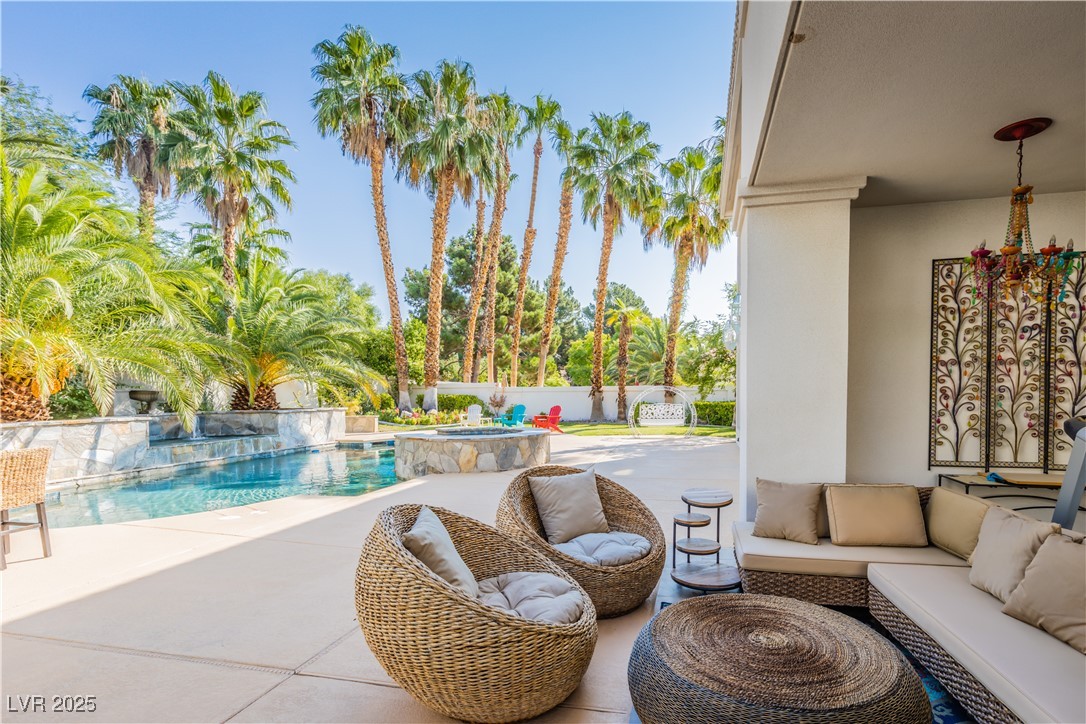 2339 Prometheus Court Henderson, NV 89074 - Photo 10 of 92 View of patio featuring an outdoor hangout area, a